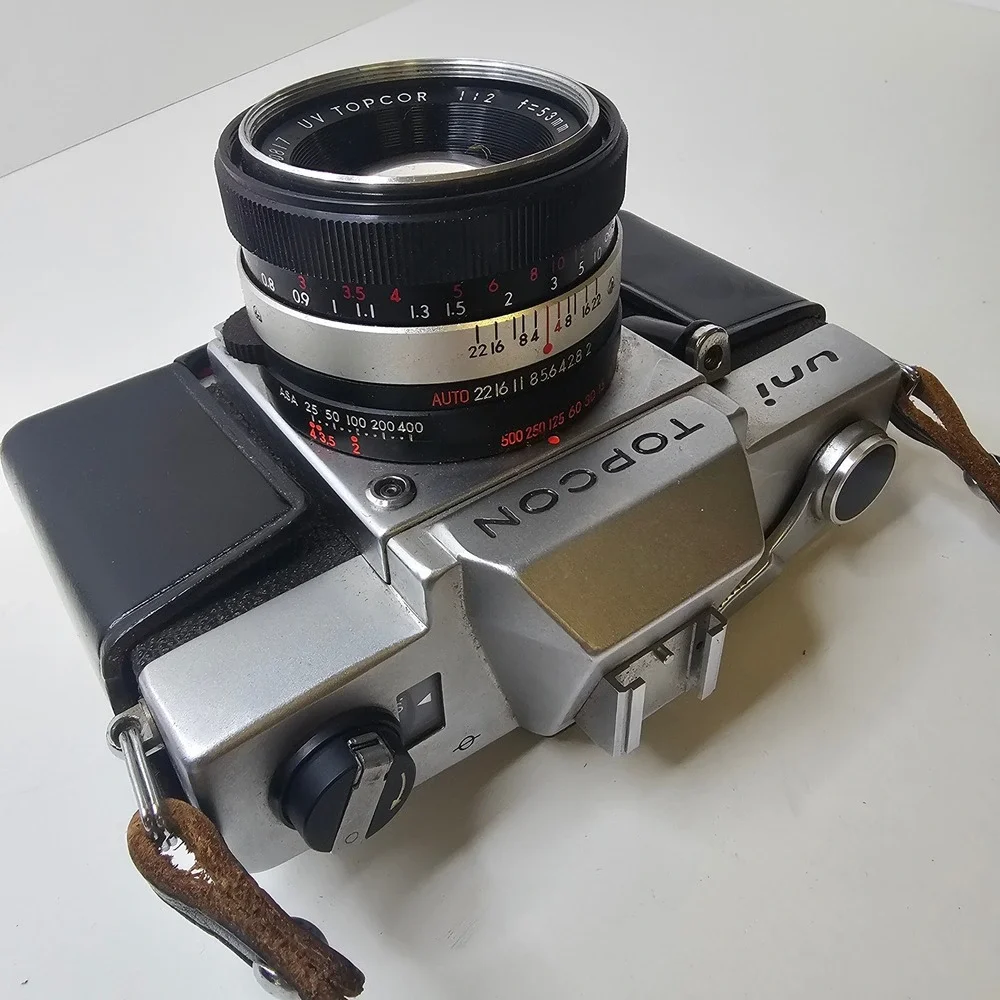 Vintage Topcon Uni 35mm SLR Camera with UV Topcor 53mm f2 Lens and Case Untested